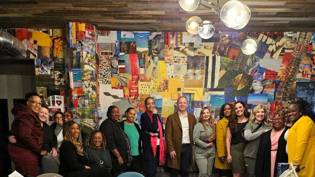 Group of Women and Speaker at Feast & Finance event featuring Graham Douds and Wills and Living Trusts.